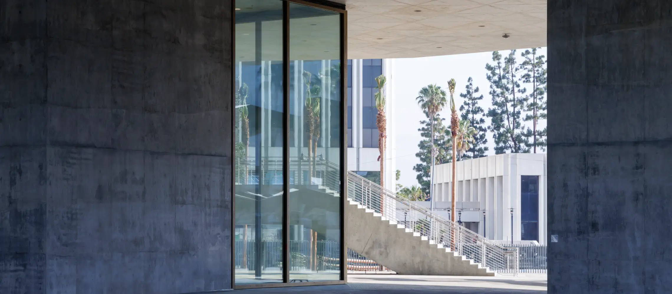 David Geffen Galleries at LACMA; exterior view from East West Bank Commons south toward Wilshire Boulevard, photo © Iwan Baan